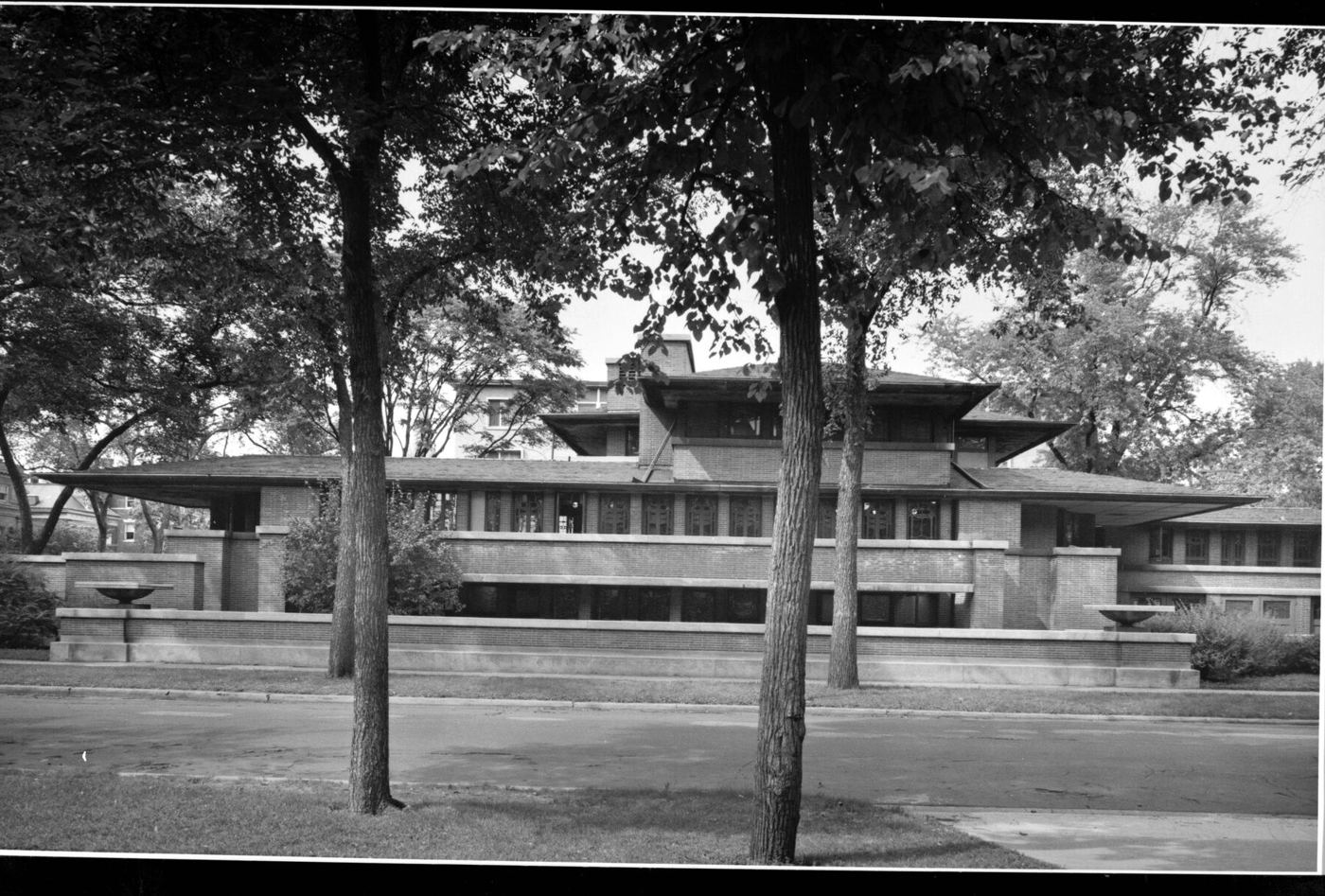 The building the drawings describe: the Robie House from the south, photographed by Cervin Robinson for the sa
