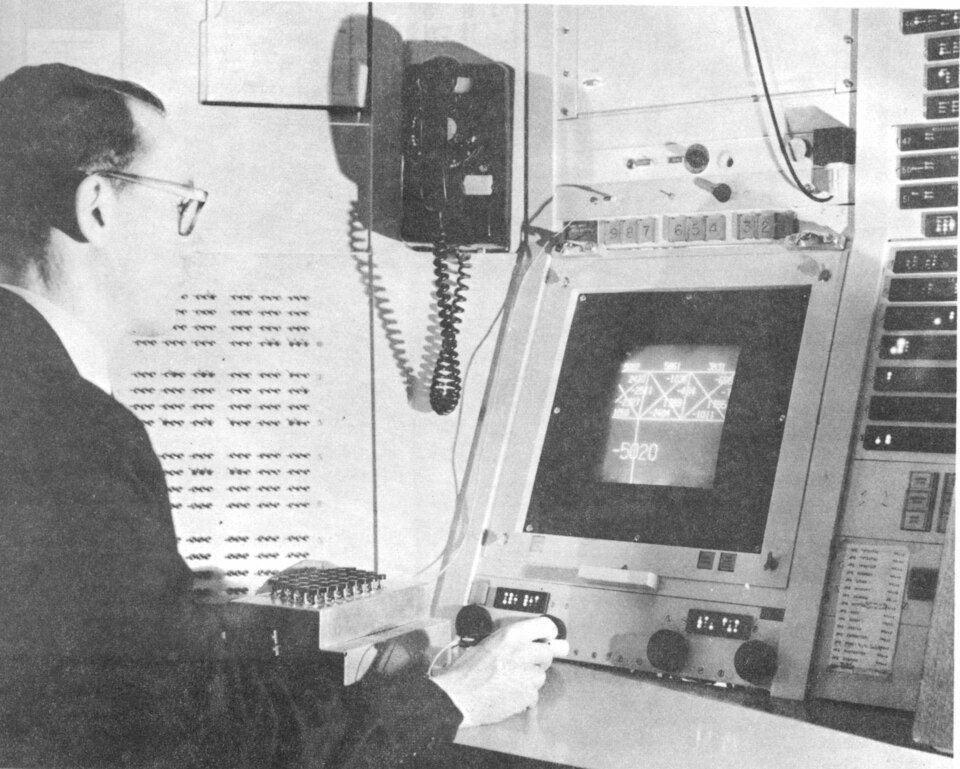 Ivan Sutherland at the console of the TX-2 at MIT Lincoln Laboratory, drawing with Sketchpad using a light pen